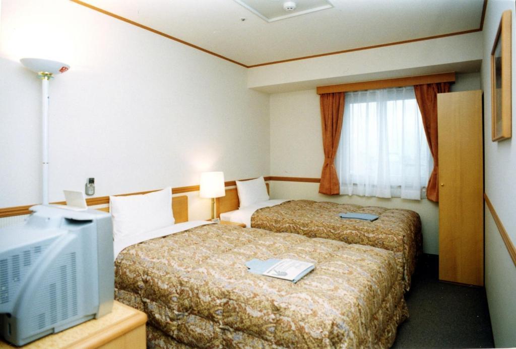 Toyoko Inn Niigata Ekimae Szoba fotó